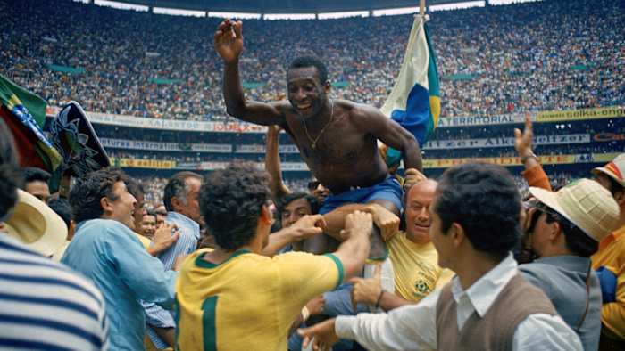 Pelé is lifted in celebration after Brazil’s 1970 World Cup triumph